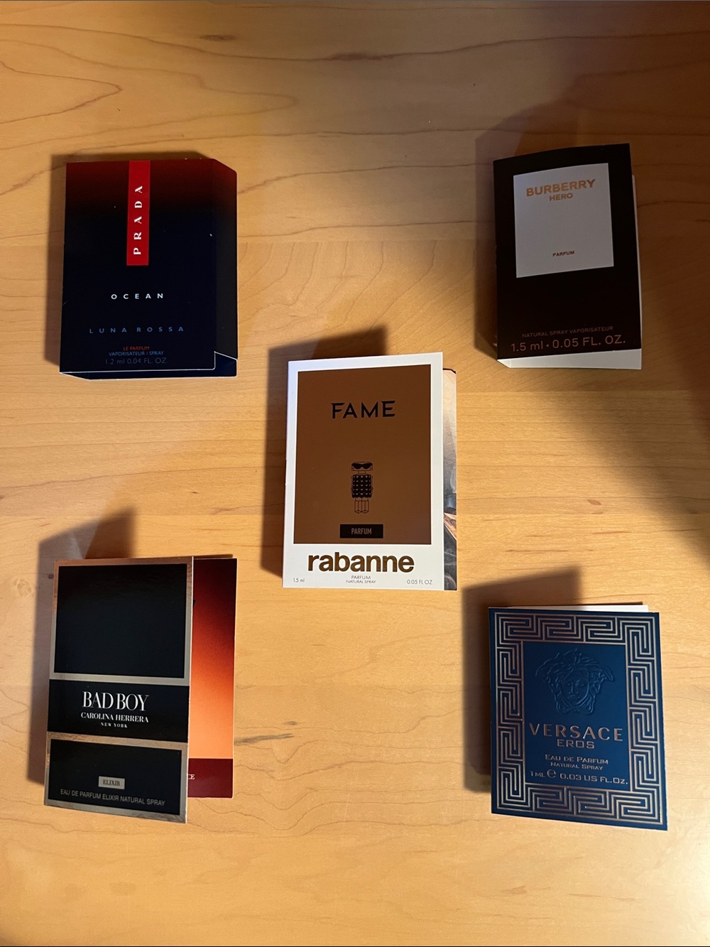 Assorted men’s fragrance samples including Prada Ocean